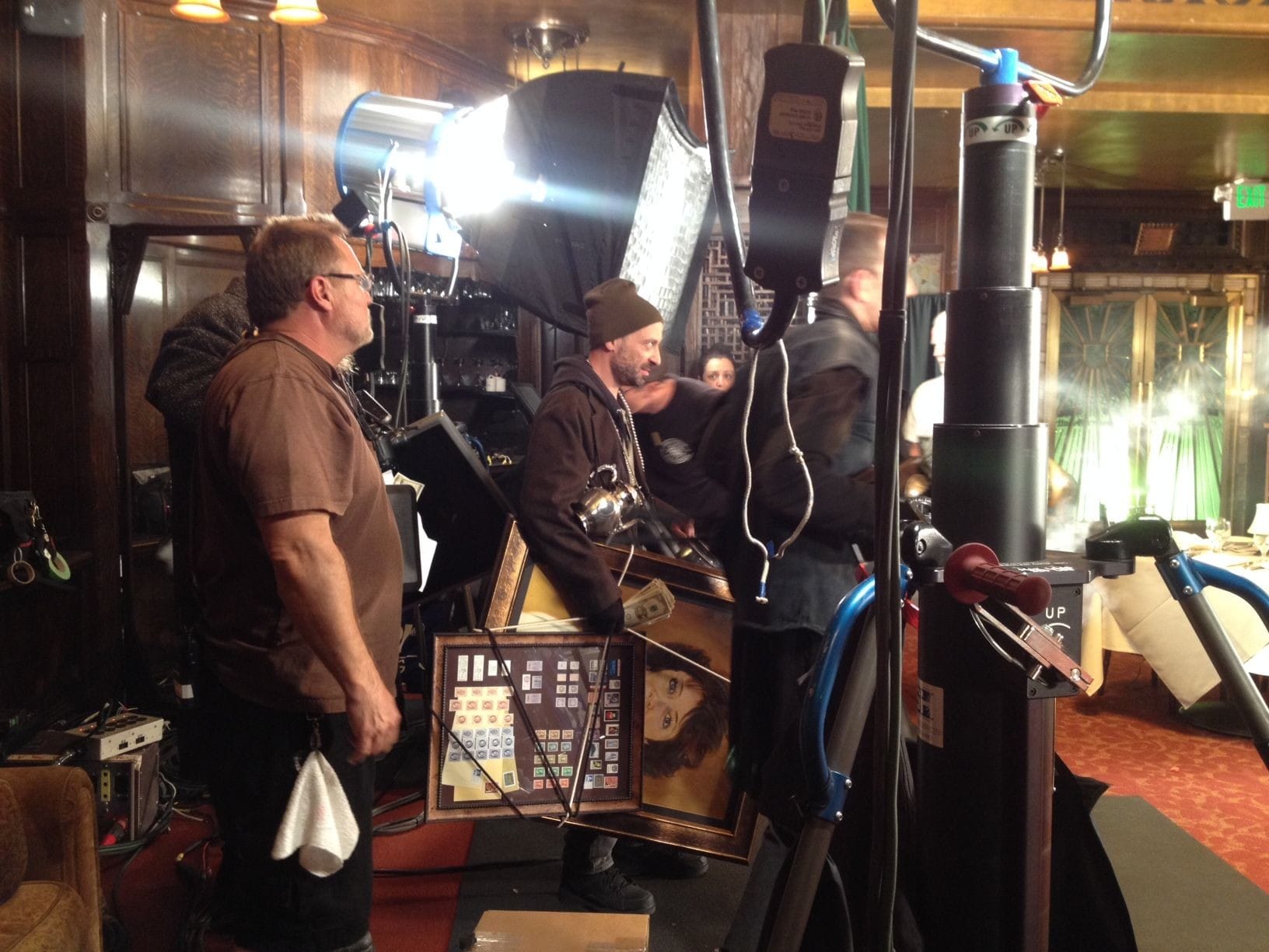 Actor Jeff Blumberg on set shooting a TV commercial, playing the role of a burglar