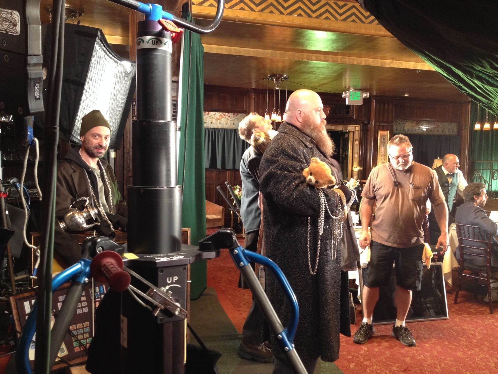 Actor Jeff Blumberg on set shooting a TV commercial, playing the role of a burglar